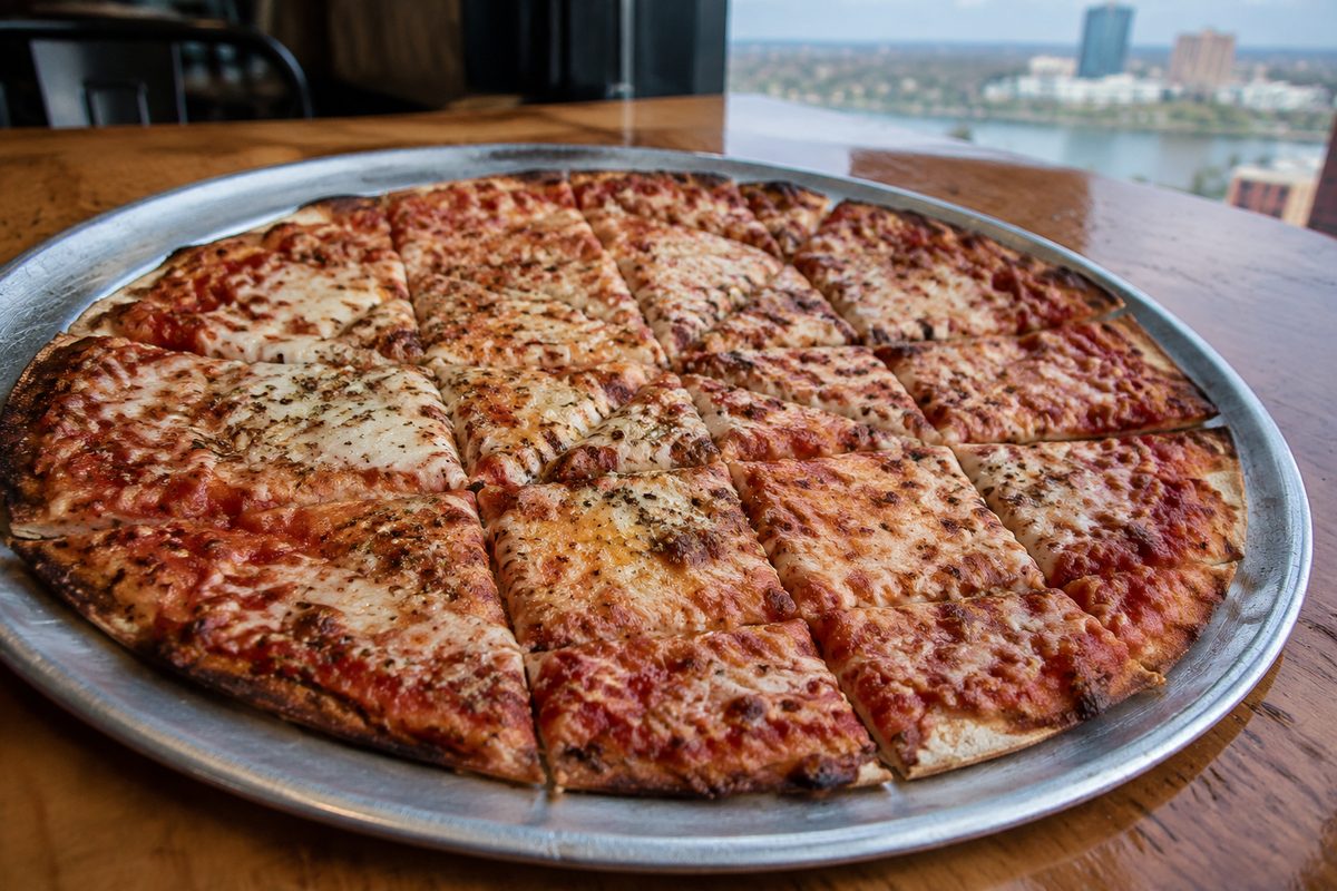 Toledo tavern style thin crust pizza cut into bite-sized party squares